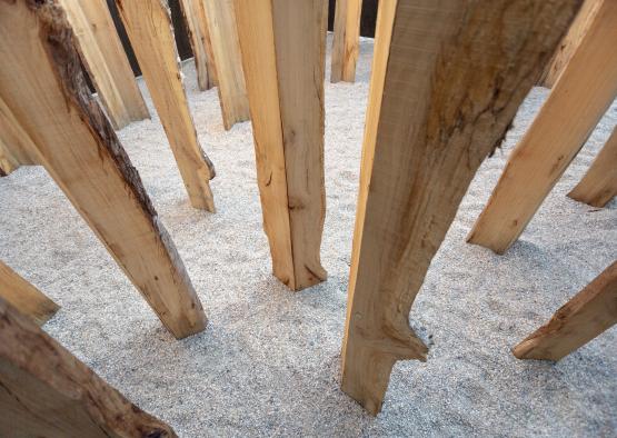 a wood structure with sand