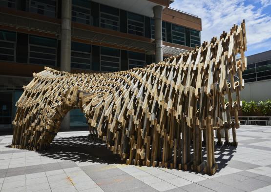 a sculpture of a horse made of wood