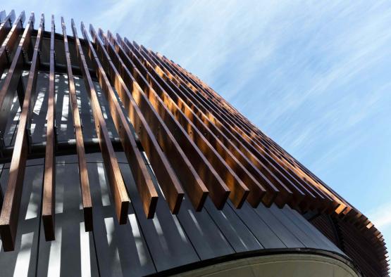 a building with a wooden slat over it