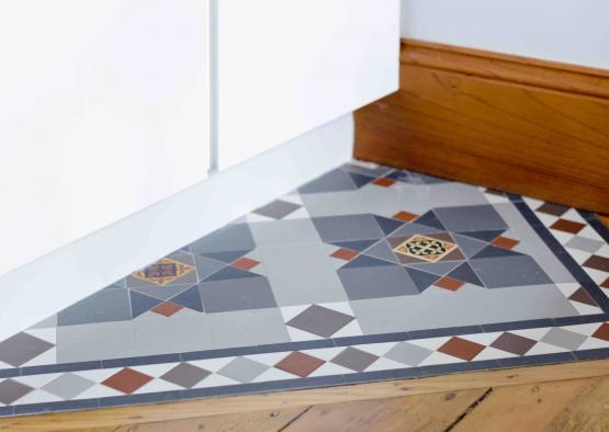 a floor with a tile floor