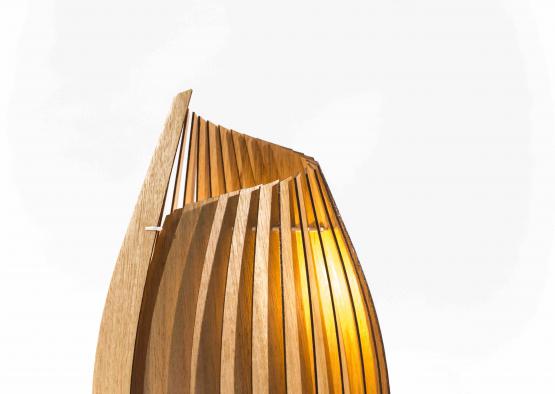 a wooden lamp with a light inside