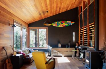 a room with a surfboard above it