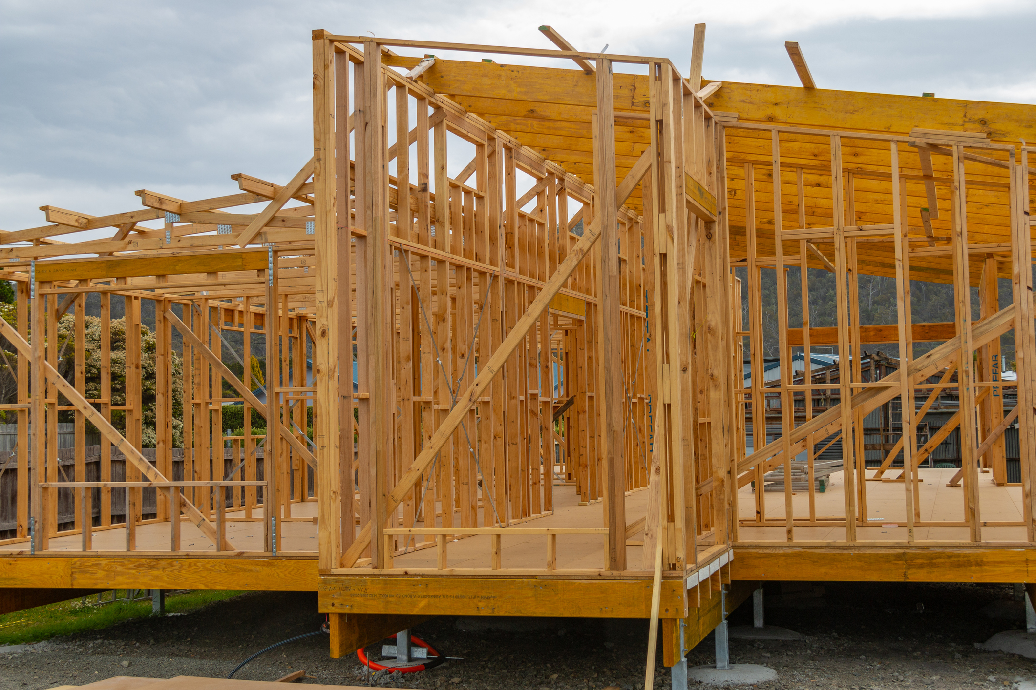 Timber framed post and beam work in house under construction