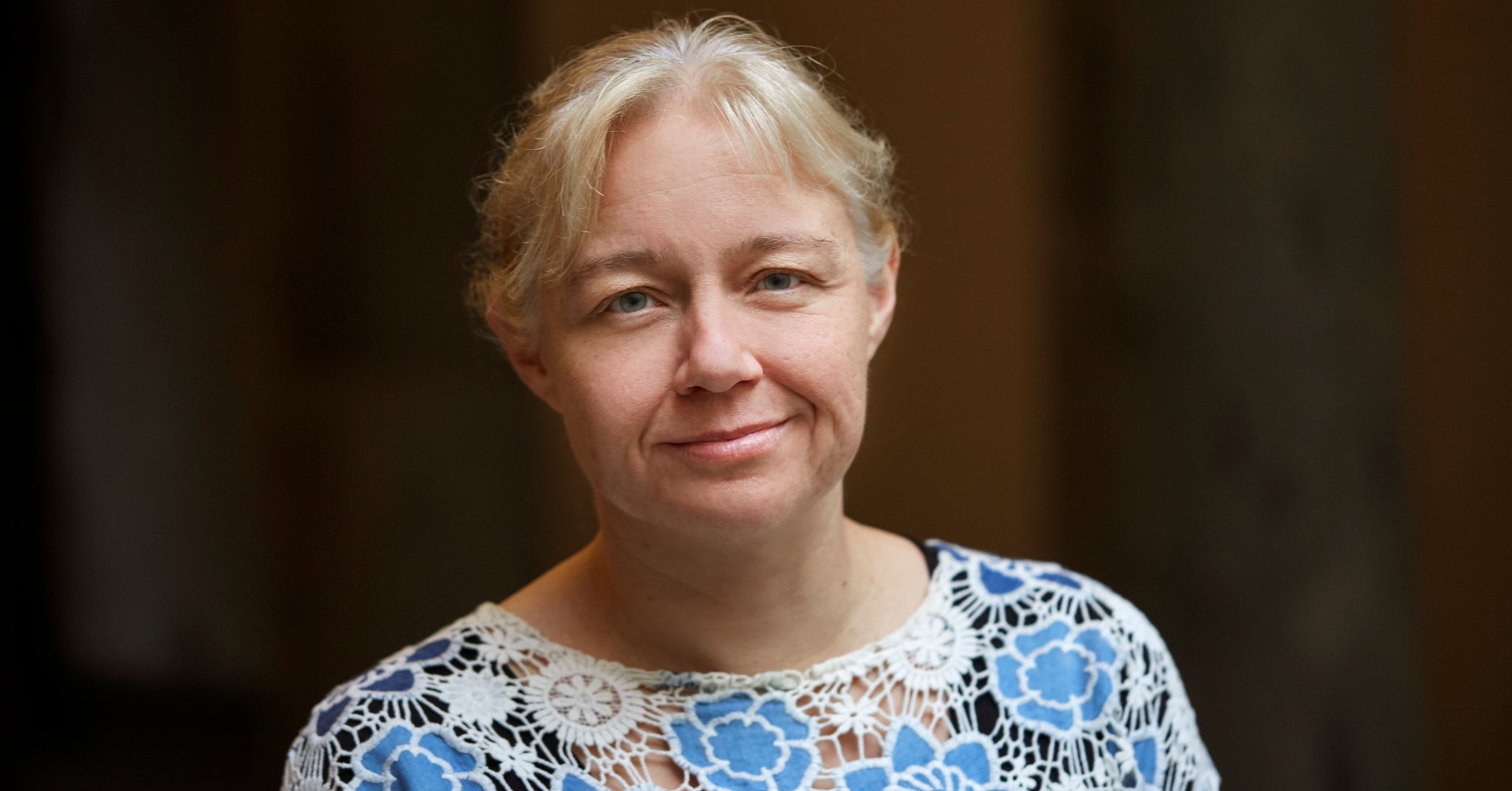 a woman smiling for the camera