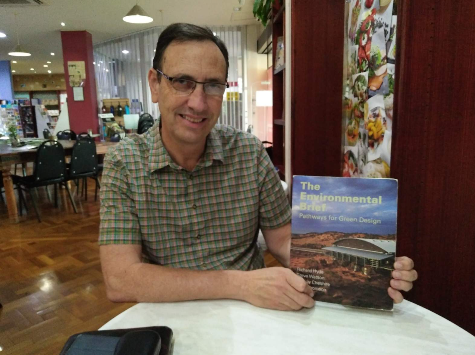 a man holding a book