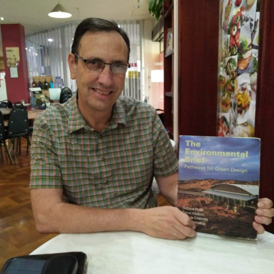 a man holding a book