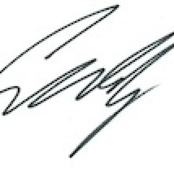 a signature on a white background