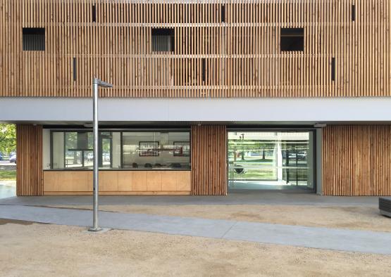 a building with a wooden wall