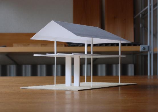 a model of a house on a table