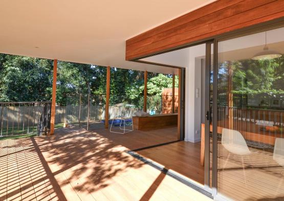 a deck with glass doors