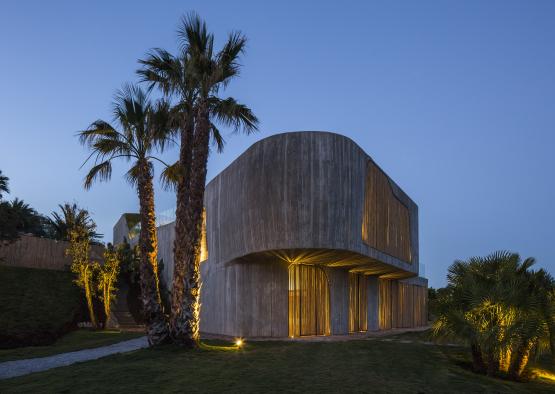 a building with trees and lights