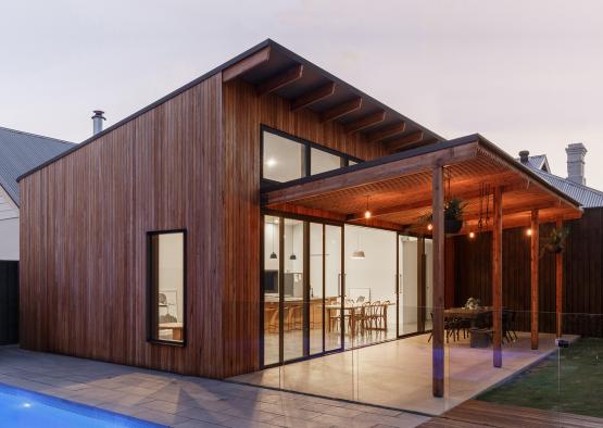 a house with a pool and a patio