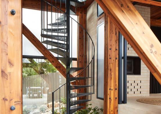 a spiral staircase inside a house