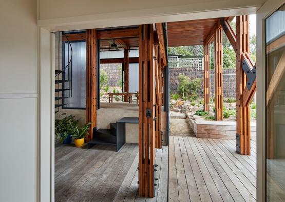 a wooden deck with a spiral staircase