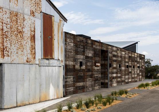 a building with a wall of wood