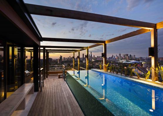 a pool with a view of a city