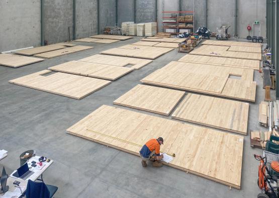 a man working on a large floor