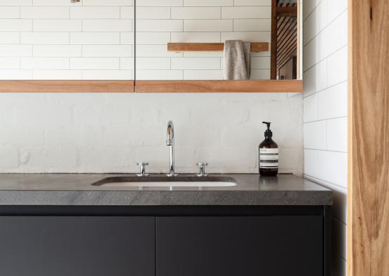 a sink and mirror in a bathroom