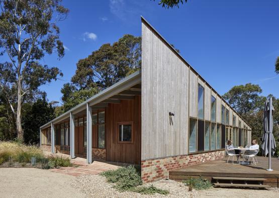 a building with a roof and a patio