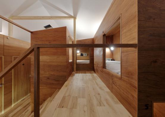 a room with wood walls and a wood floor