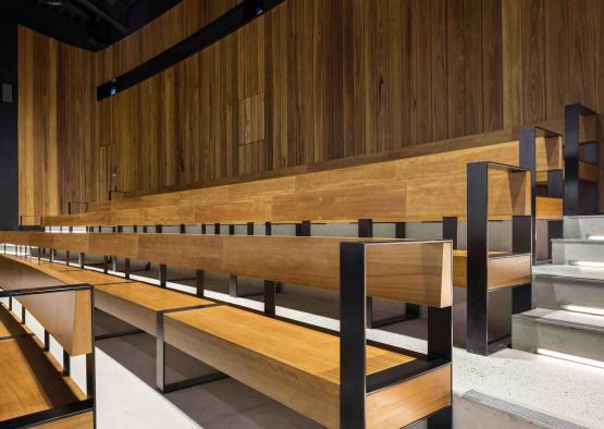 a wooden benches in a room