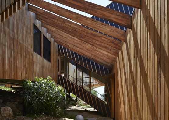 a wood building with a roof