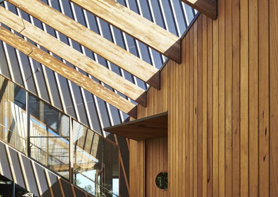 a wooden building with a staircase