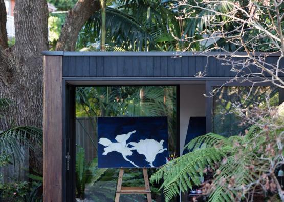 a painting on a stand in a shed