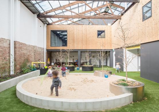 a group of kids playing in a sandbox