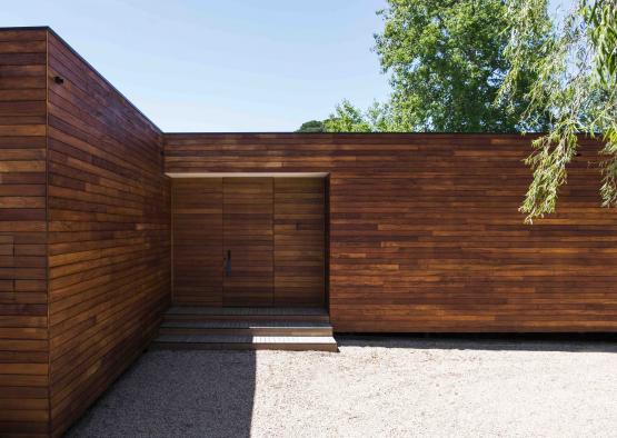 a wooden building with a door