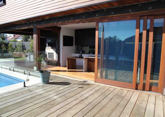 a deck with a glass door