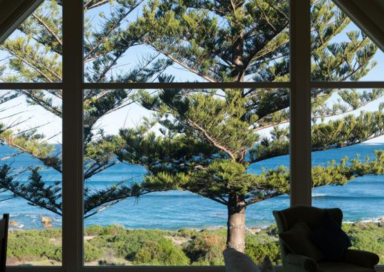 a view of the ocean from a window