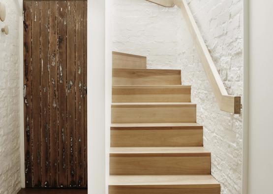 a wooden stairs in a house