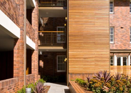 a building with a wood wall