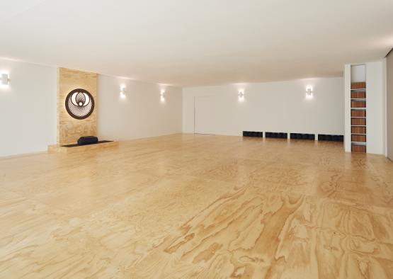 a large room with a wooden floor