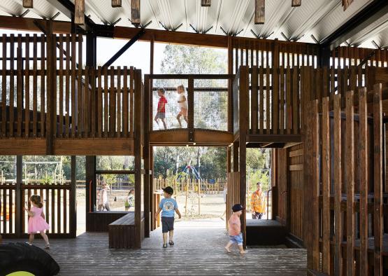 a group of kids playing in a playground