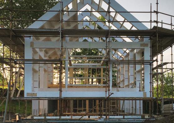 a building under construction with scaffolding