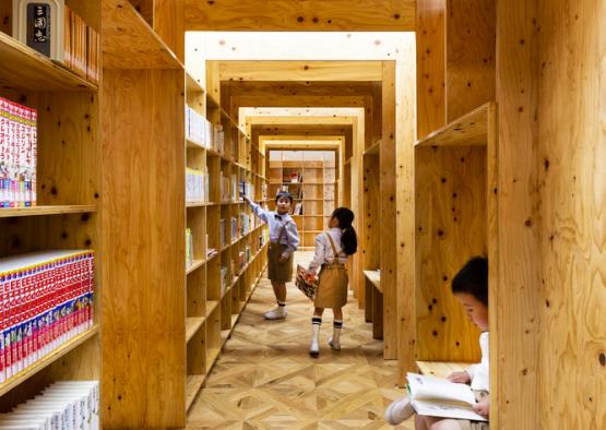 a group of kids in a library