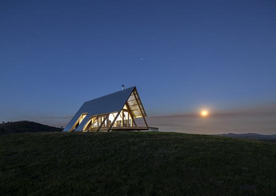 a house on a hill at night