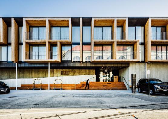 a building with a person walking up stairs