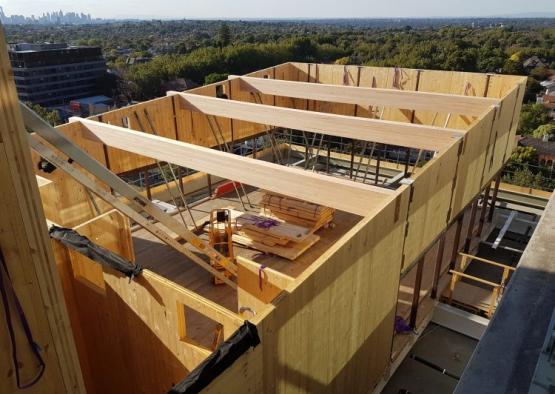 a building being built with wood