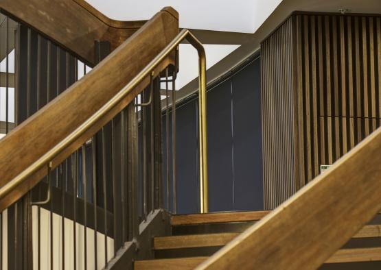 a staircase with metal railings