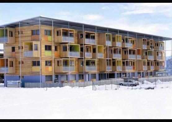 a building with snow on the ground