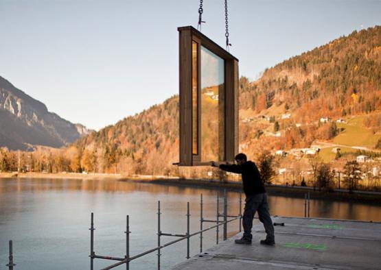 a man holding a rectangular window