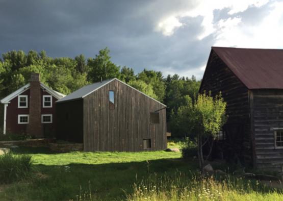 a group of buildings in a field