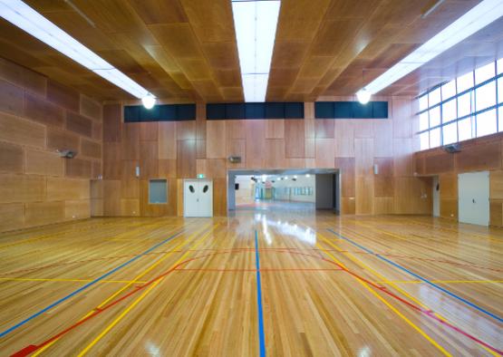 a large room with a basketball court