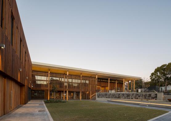 a building with a lawn and grass