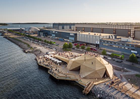 a large building next to a body of water