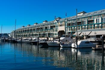 a row of boats in a harbor