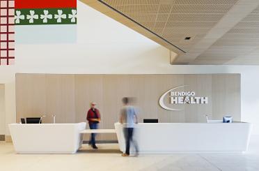 people standing in front of a reception desk